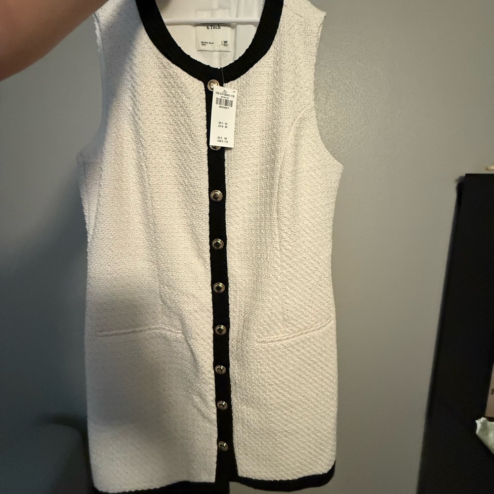 White Sleeveless Dress with Black Trim